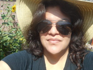 Selfie of me (V) in the garden wearing a sun hat and sunglasses