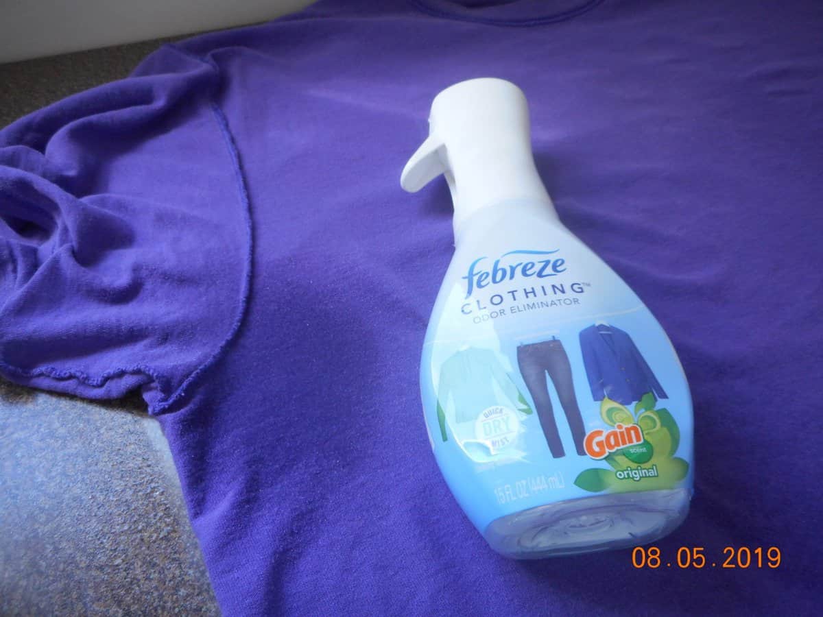 febreze original gain scent spray with purple shirt