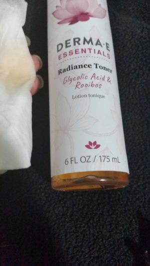 Essentials Radiance Toner on a tissue showing toner color