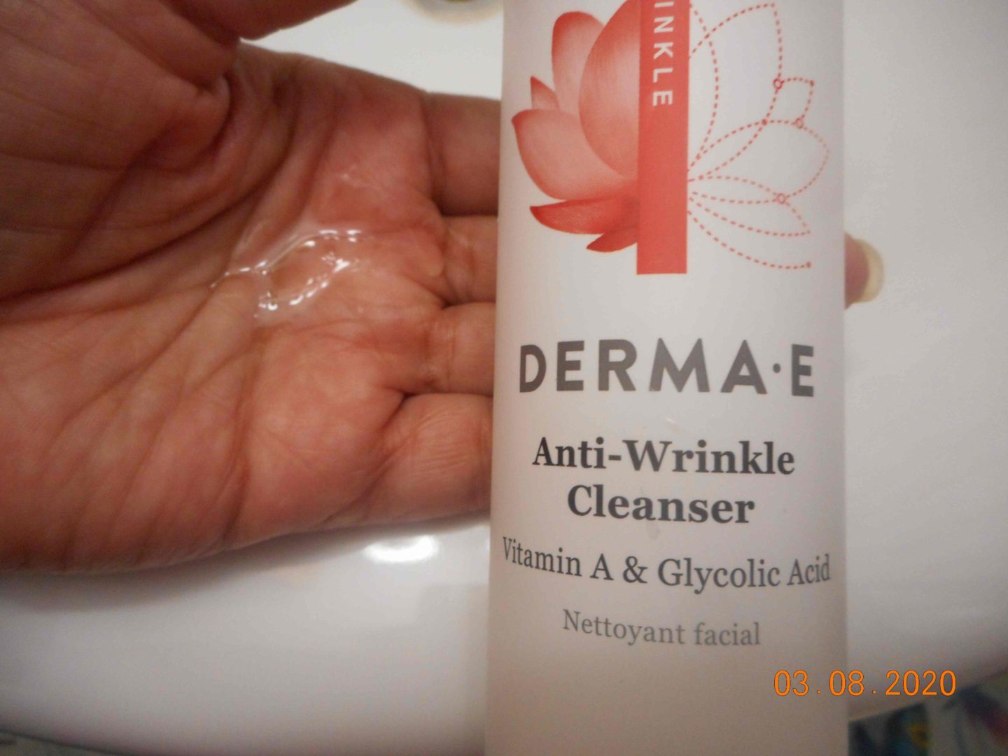 derma-e cleanser inhand with bottle anti-wrinkle cleanser