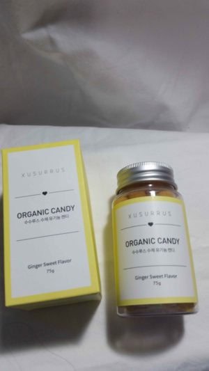 XUSURRUS ORGANIC CANDIES GINGER SWEET FLAVOR box with bottle