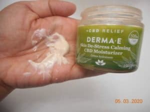 Derma-E Skin De-stress calming CBD moisturizer open jar moisturizer in my hand