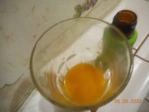 top view of Boomerang drink in a glass. Drink color is orange