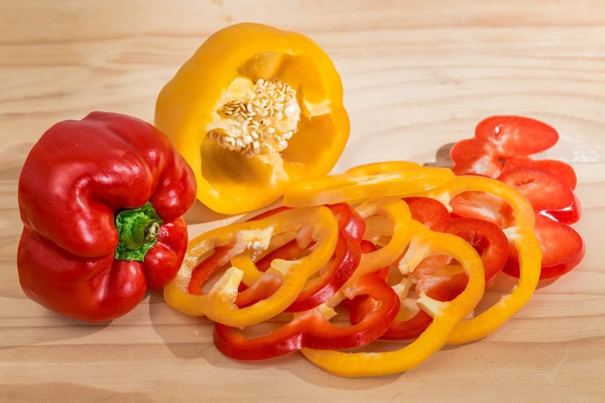 Bell Peppers red and yellow whole and sliced in rings