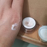 Estee Lauder Revitalizing Supreme Plus Global Anti-aging Creme on my hand with open jar