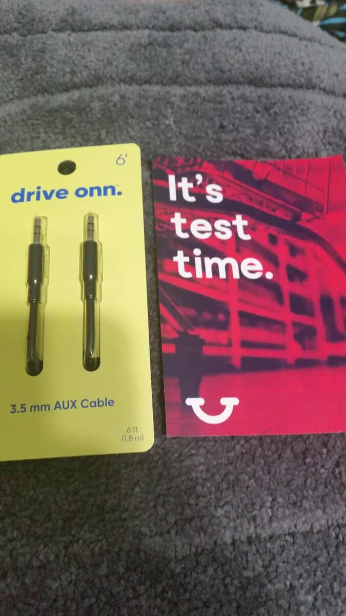 ONN aux cable in package with home tester club info card