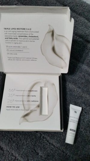 skinceuticals triple lipid restore 2 4 2 sample tube with box. inside view of box.