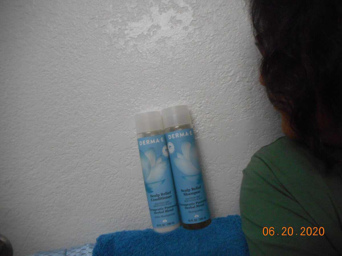 Derma-E Scalp Relief conditioner and shampoo conditioner left shampoo right me off to the side