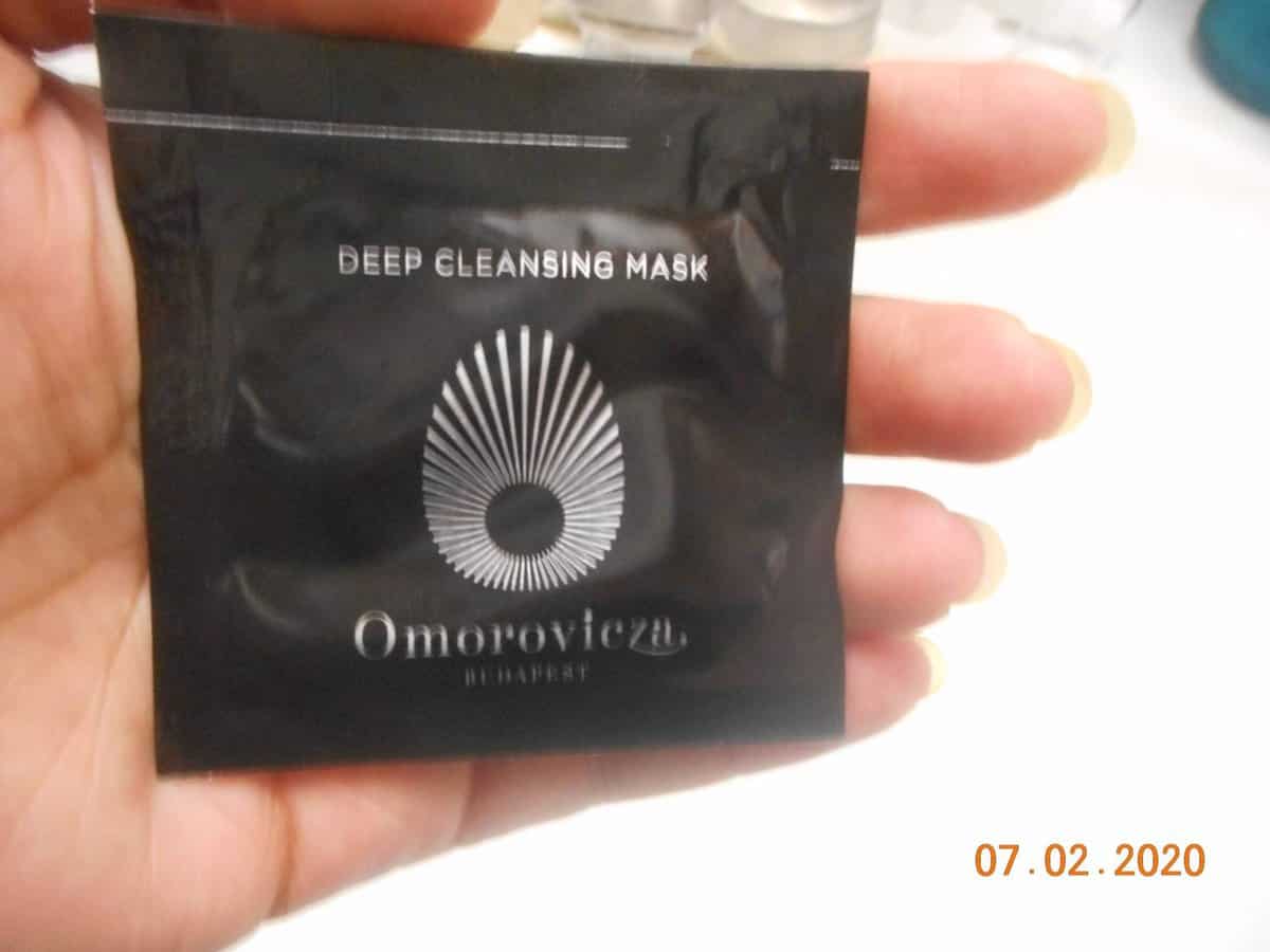 Omorovicza deep cleansing mask pack in hand.