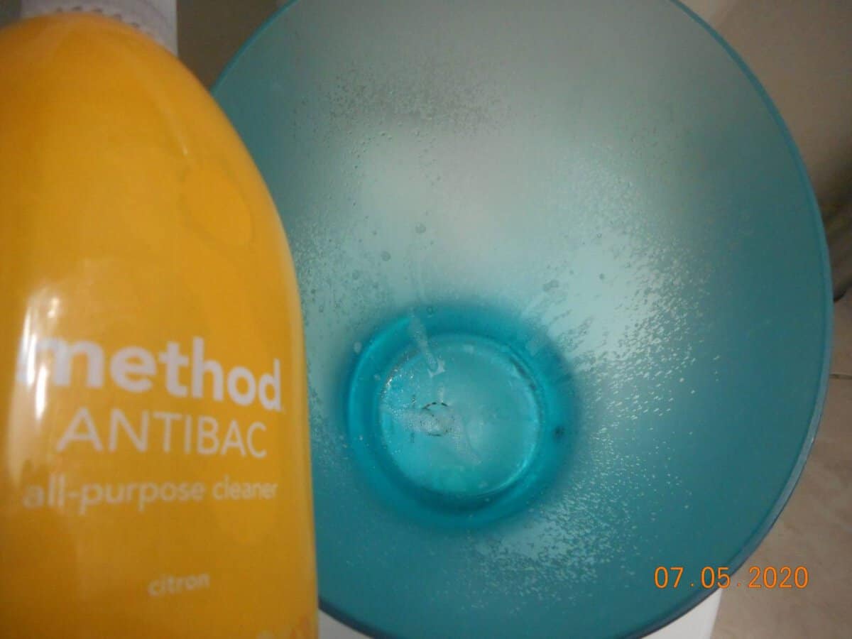 Method Citron Antibacterial All Purpose Spray over trash can. Spray pattern in trash can.