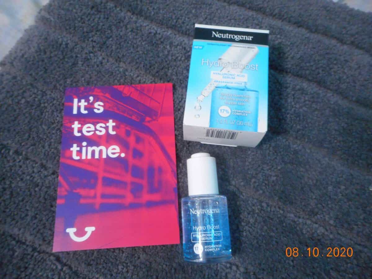 Neutrogena® Hydro Boost Hyaluronic Acid Serum bottle with box and Home Tester Club note card.