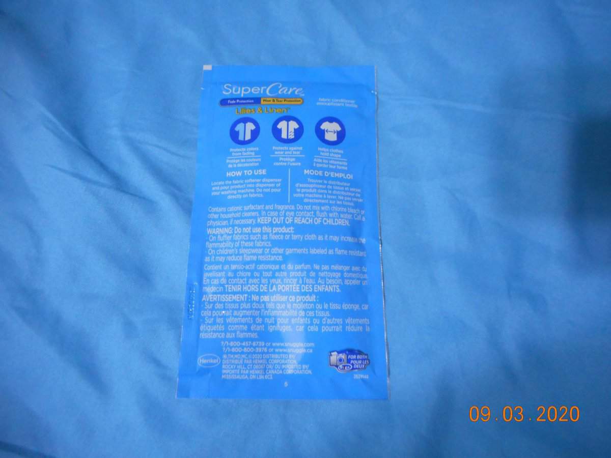 Snuggle® SuperCare™ Lilies and Linen fabric softener packet. Back of packet.