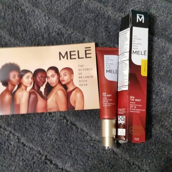 Mele skincare with note card. Mele DEW THE MOST moisturizer with spf 30. tube with box
