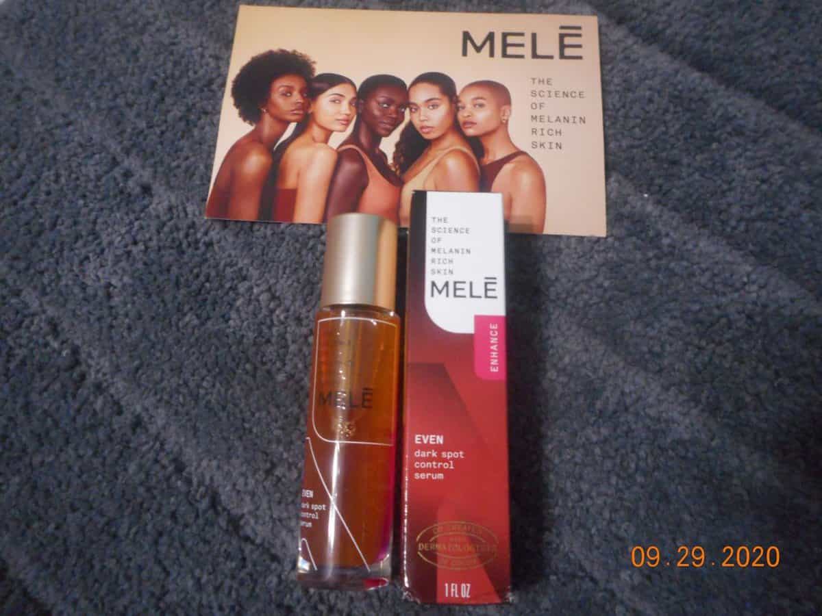 side of Mele skincare EVEN Dark Spot Control Serum bottle with box and note card.