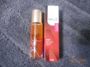 side of Mele skincare EVEN Dark Spot Control Serum bottle with box.