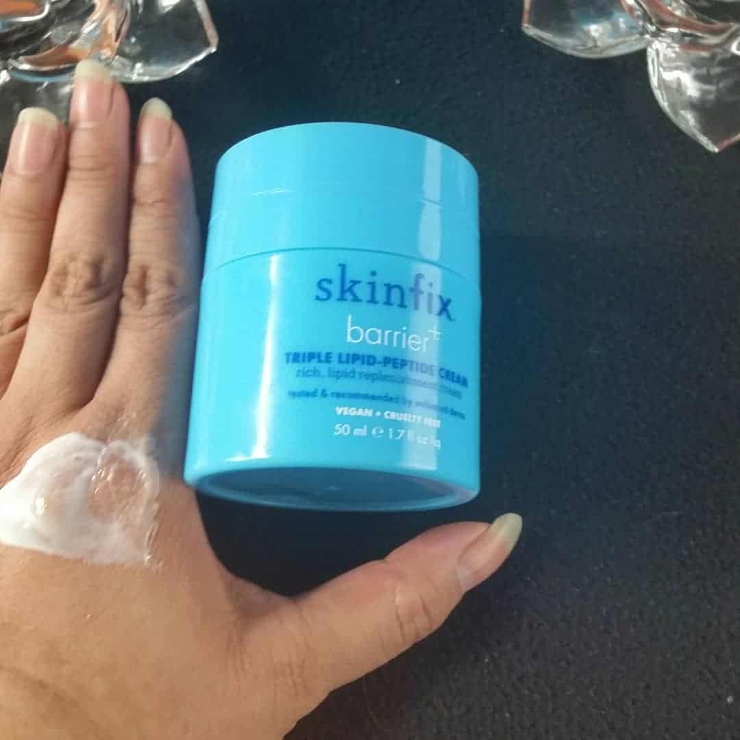 skinfix jar with some product on my hand.