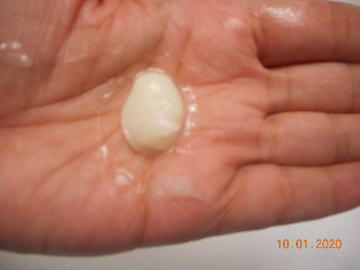 a glob of universal cleansing balm in my hand.