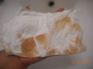 a tissue after I wiped the excess cleansing balm off my hands.