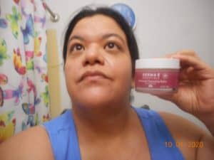 my face after using the Derma-e universal cleansing balm. jar in hand.