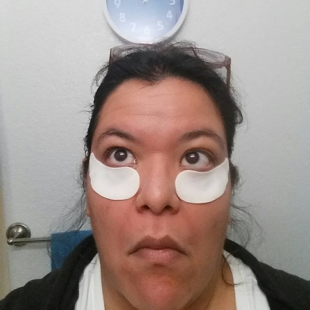 me wearing smoky orchid skin eye patches. 