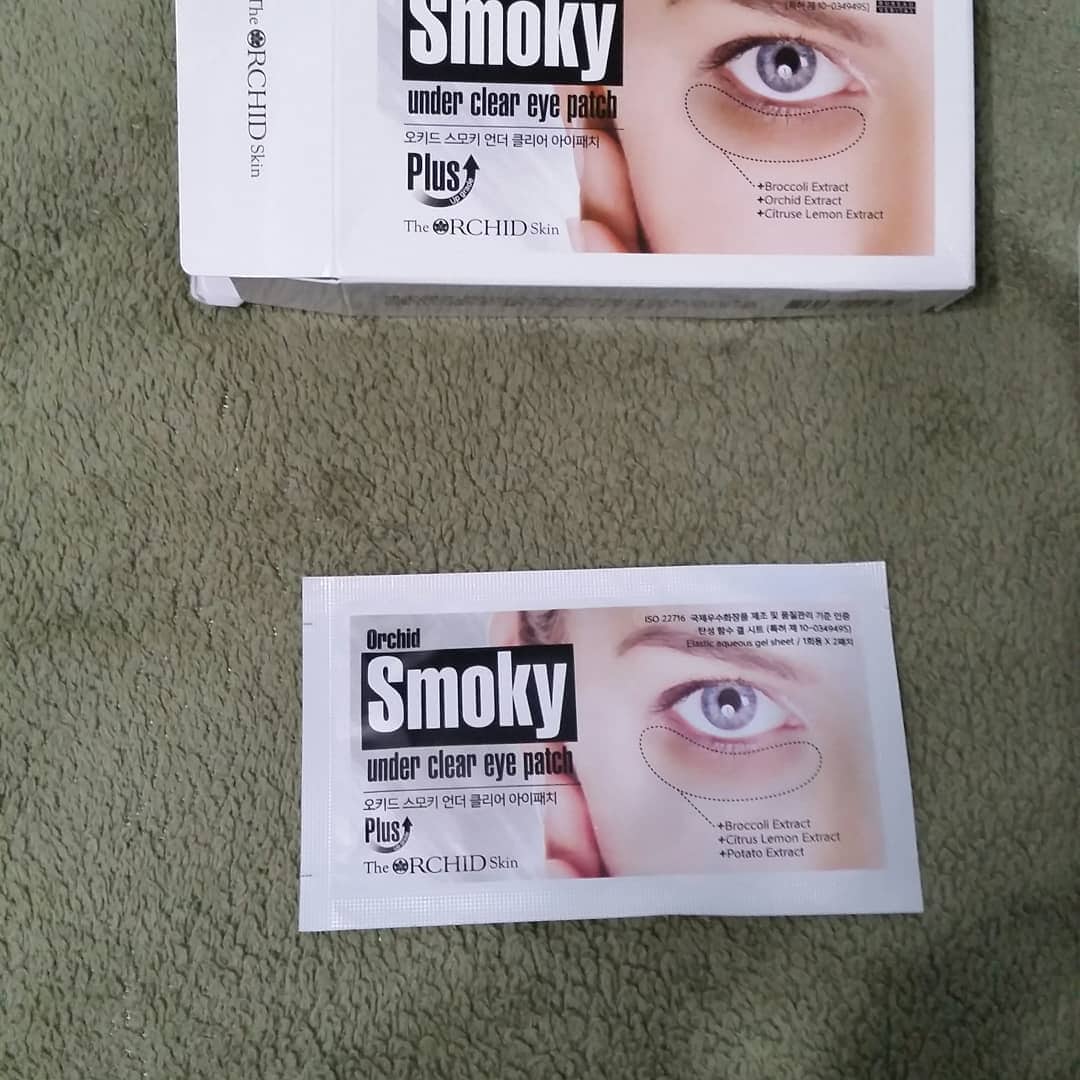 Orchid smoky eye box with packet of eye patches. 