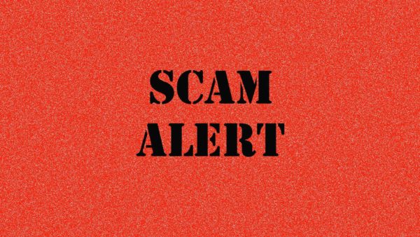 scam alert banner red background with bolack text.