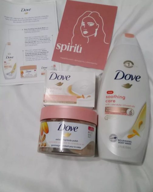 Dove Soothing care collection with note card from dove and Spiritu. box included body wash, body bar (soap) and an exfoliating polish.