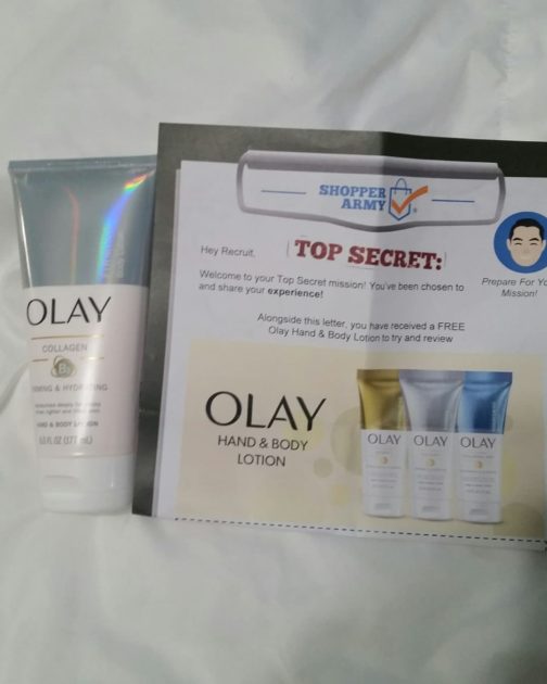 Olay firming collagen hand and body cream tube with shopper army info sheet.