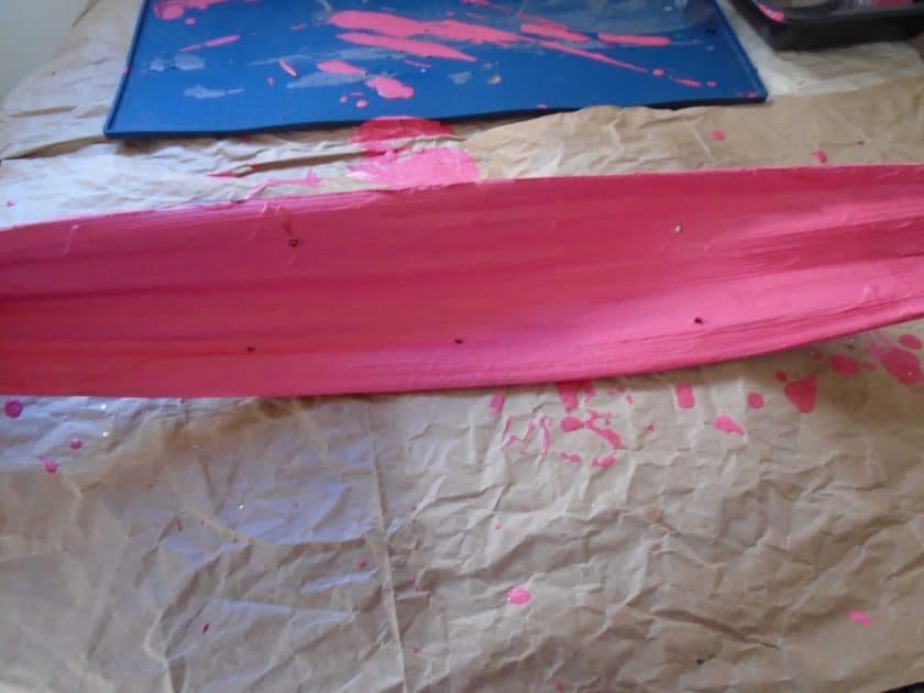 paint poured palm bark. Pink paint.