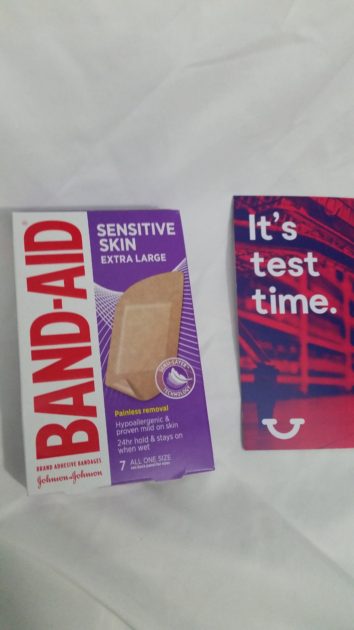 BandAid sesitive skin extra large bandage box with Home Tester club info card.
