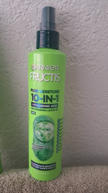 Garnier Fructis pure mositre 10 in 1 spray bottle. bright green mist top bottle.