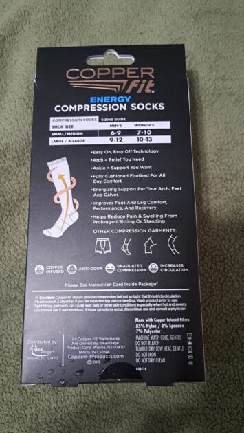 back of copper fit compression socks box. the back has a sizing charge and info about the socks.