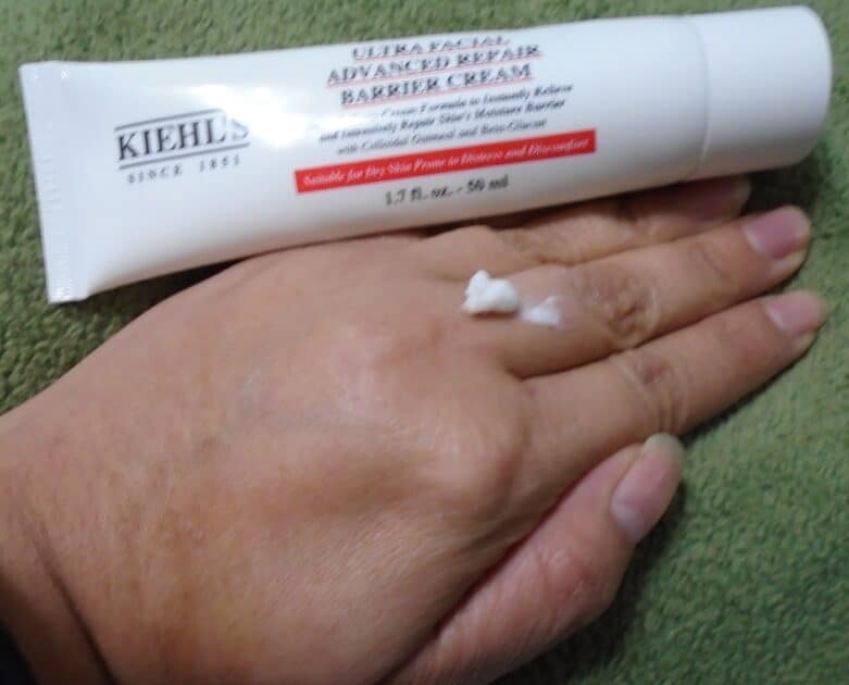 Kiehl's Kiehl's Ultra Facial Advanced Repair Barrier Cream blended on my hand. cream goes from white to clear.