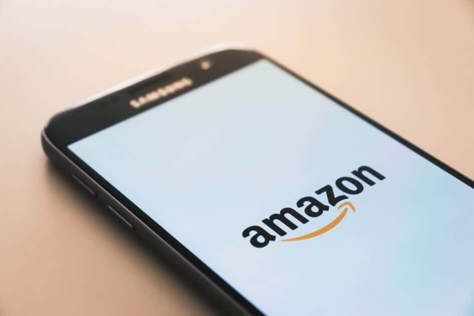 black Samsung Galaxy smartphone displaying Amazon logo image source unsplash Photo by Christian Wiediger