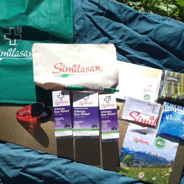 Similasan pack: reusable bag, canvas bag, note pad, magnetic clip, pen, 2 allergy relief eye drops, 1 box individual eye drops 2 cloths one for cleaning lenses and the other for protecting them and 2 kleenex products wipes and tissues.