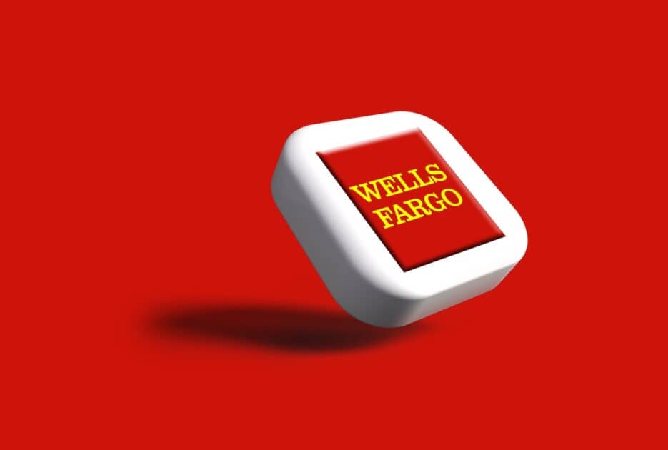 Wells Fargo logo on a tile on a red background. Image source Unsplash dot com.