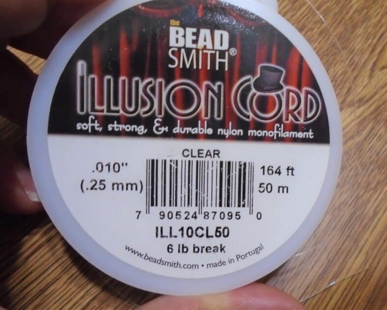 bead smith illusion cord clear 164 ft 0.010 inch .25 mm label.