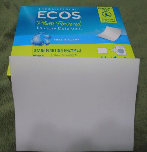 Ecos laundry sheet with product box. A single white sheet leaning again the box.