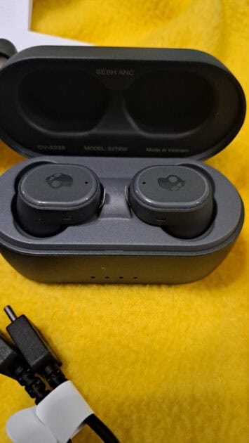 Skullcandy Sesh ANC earbuds in case.