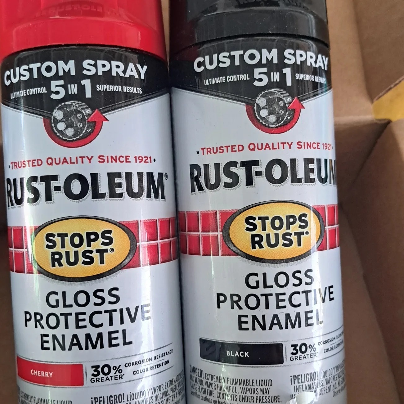 rust-oleum 5 in 1 spray paints. Gloss enamel finish. Red (left) black (right)