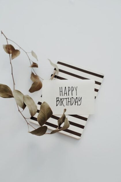 Greeting Card on a Black And White Card Photo by Vie Studio. Image source Pexels dot com.