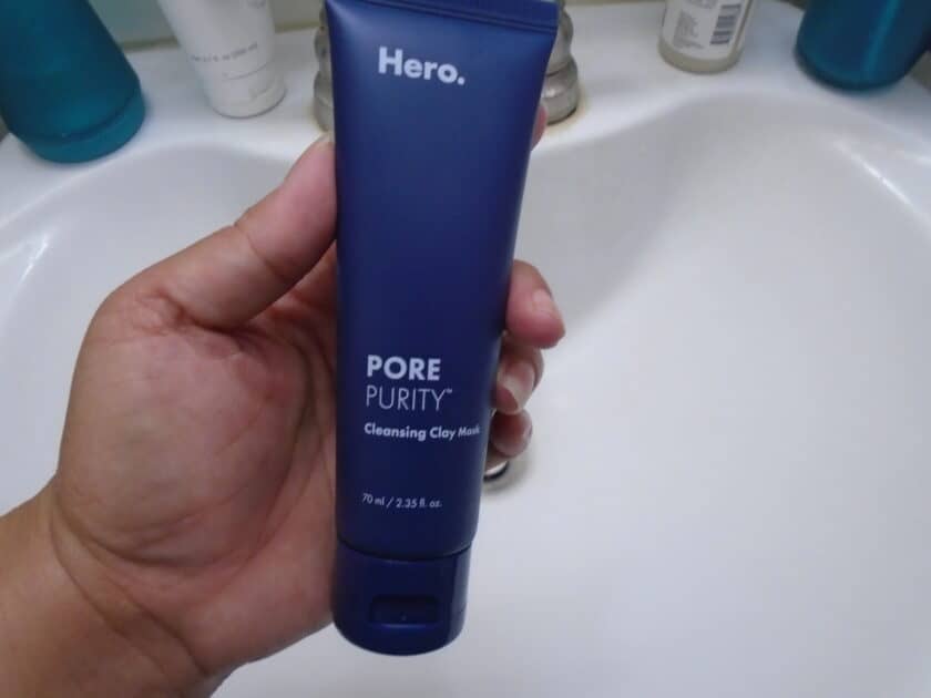 close look at the Hero Purity pore cleansing clay mask tube. Navy tube with white letters.