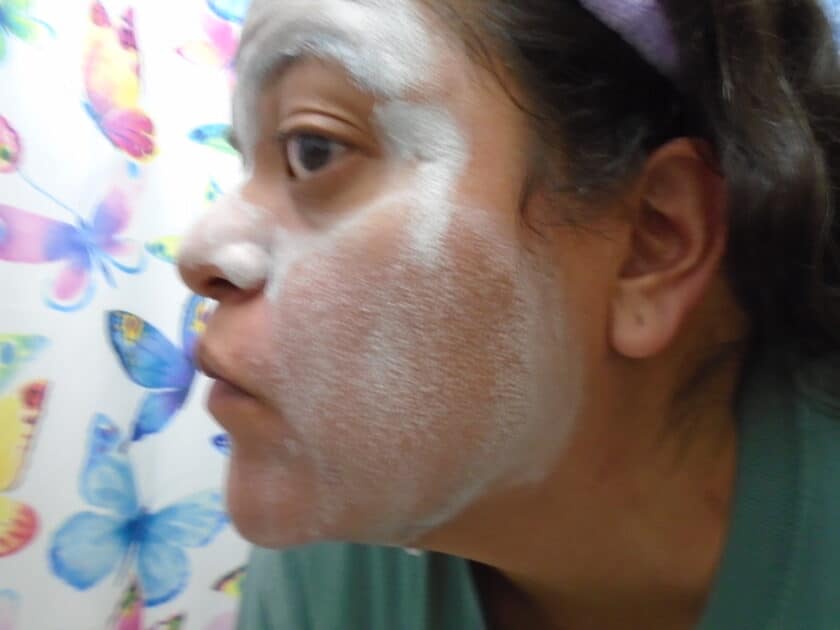 close up of rinising off Pore Purity clay mask.