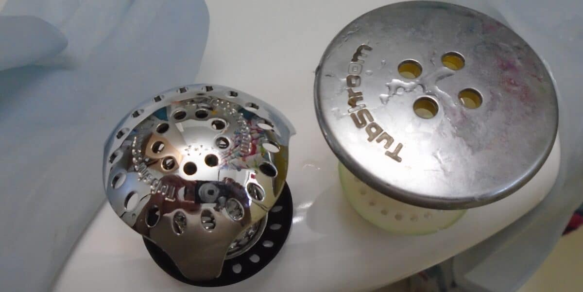 Top view comparing tubshrooms. Left stainless steel Tubshroom. Right standard chrome topped tubshroom.