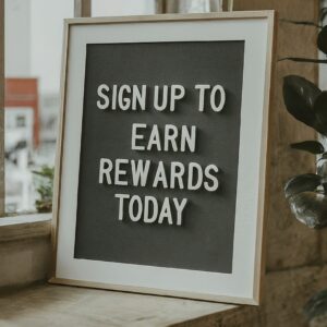 a store poster reading: Sign up to earn rewards today. image created using Image FX by gogole.
