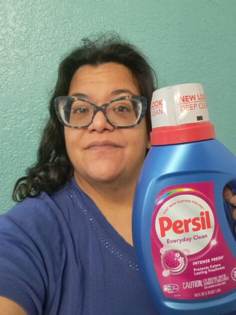 V and a bottle of Persil Laundry detergent