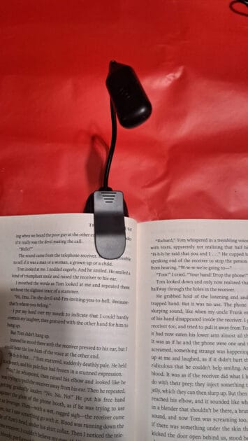 book light attached to book.