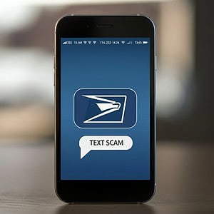 USPS logo, smart phone, text scam .