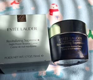 Estee lauder box and skincare jar.