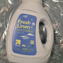 Up & Up laundry detegent bottle. Scent fresh linen.